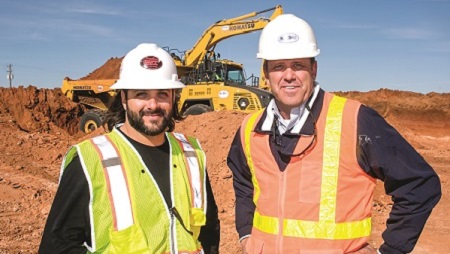 Justin Lott and Kevin Demel working on intelligent machine control for pipeline